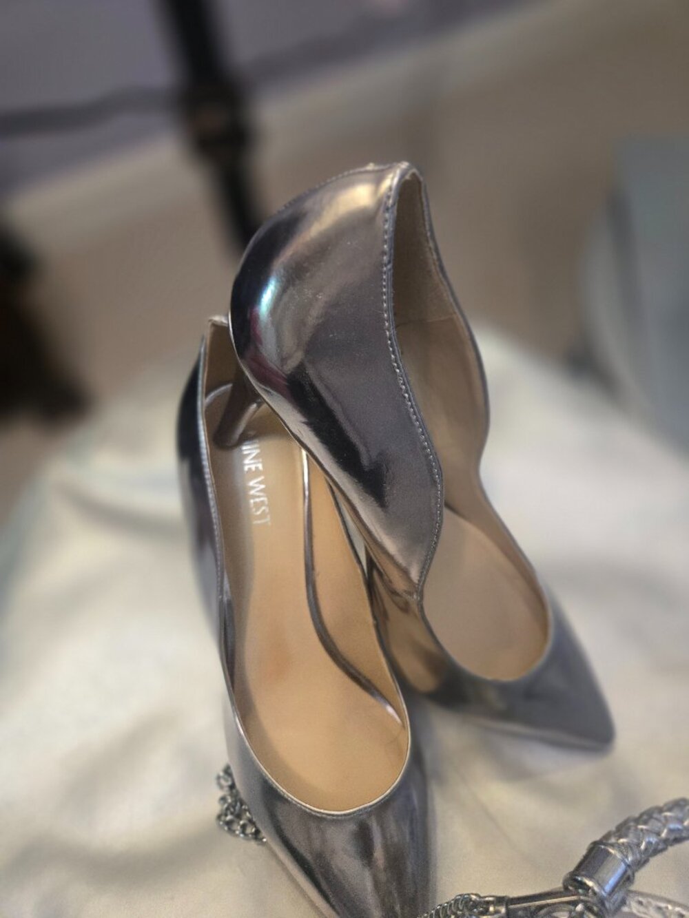 Shine the night away in this Nine West Metallic Silver Pump Size 7.5 - Picture 3 of 3